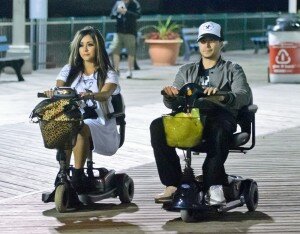 **EXCLUSIVE** Nicole 'Snooki' Polizzi and Vinny Guadagnino ride electric scooters home after partying at a nightclub on the boardwalk in Seaside Heights